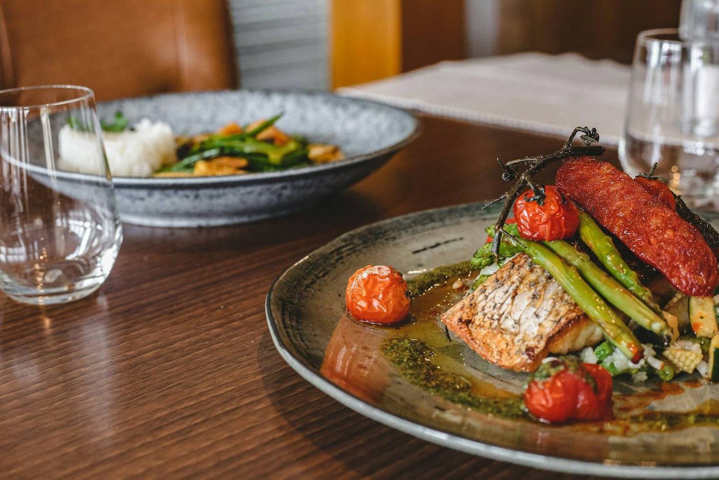 Grilled fish on a stoneware plate